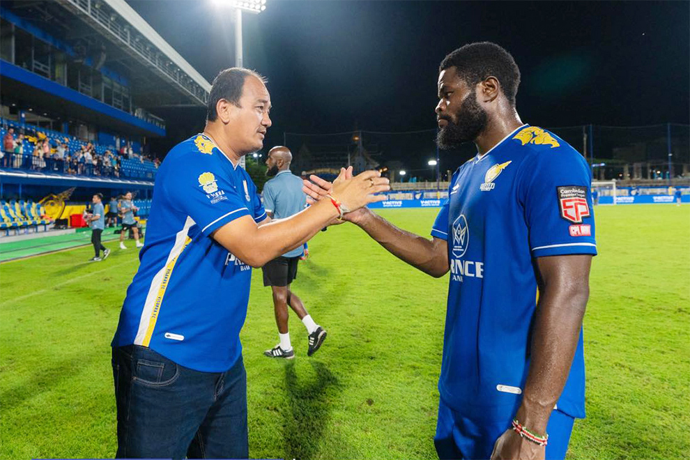 Visakha FC general secretary match speaks with a player during a match. Visakha FC