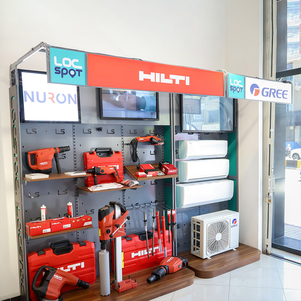 (Hilti’s LocSpot shelf showcasing a variety of tools in store)