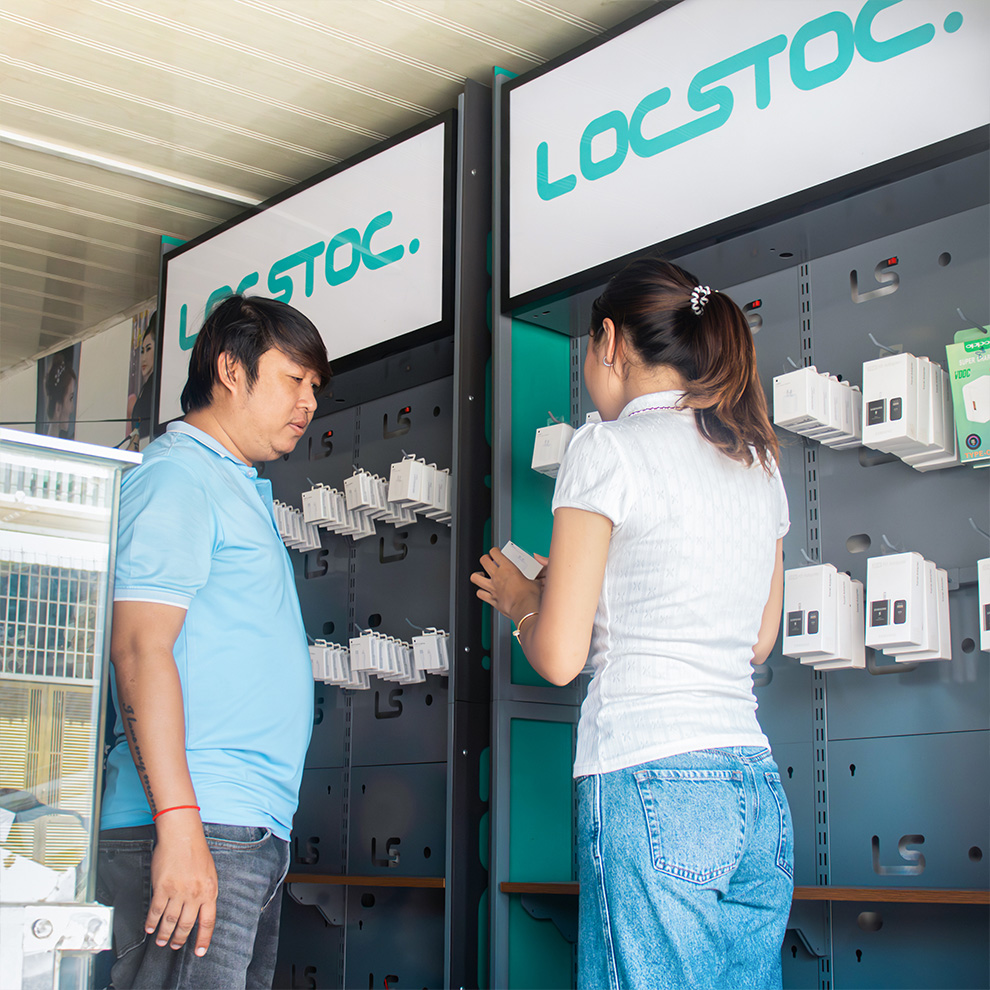 (Retailers installing products on their LocSpot shelves)