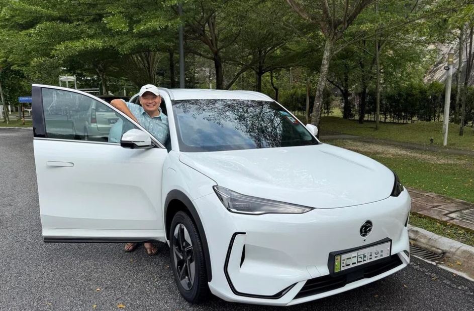 Malaysian bank executive Stanley Hoong bought Proton’s e.MAS 7 as he believes the national carmaker’s EV is here to stay. PHOTO: THE STRAITS TIMES