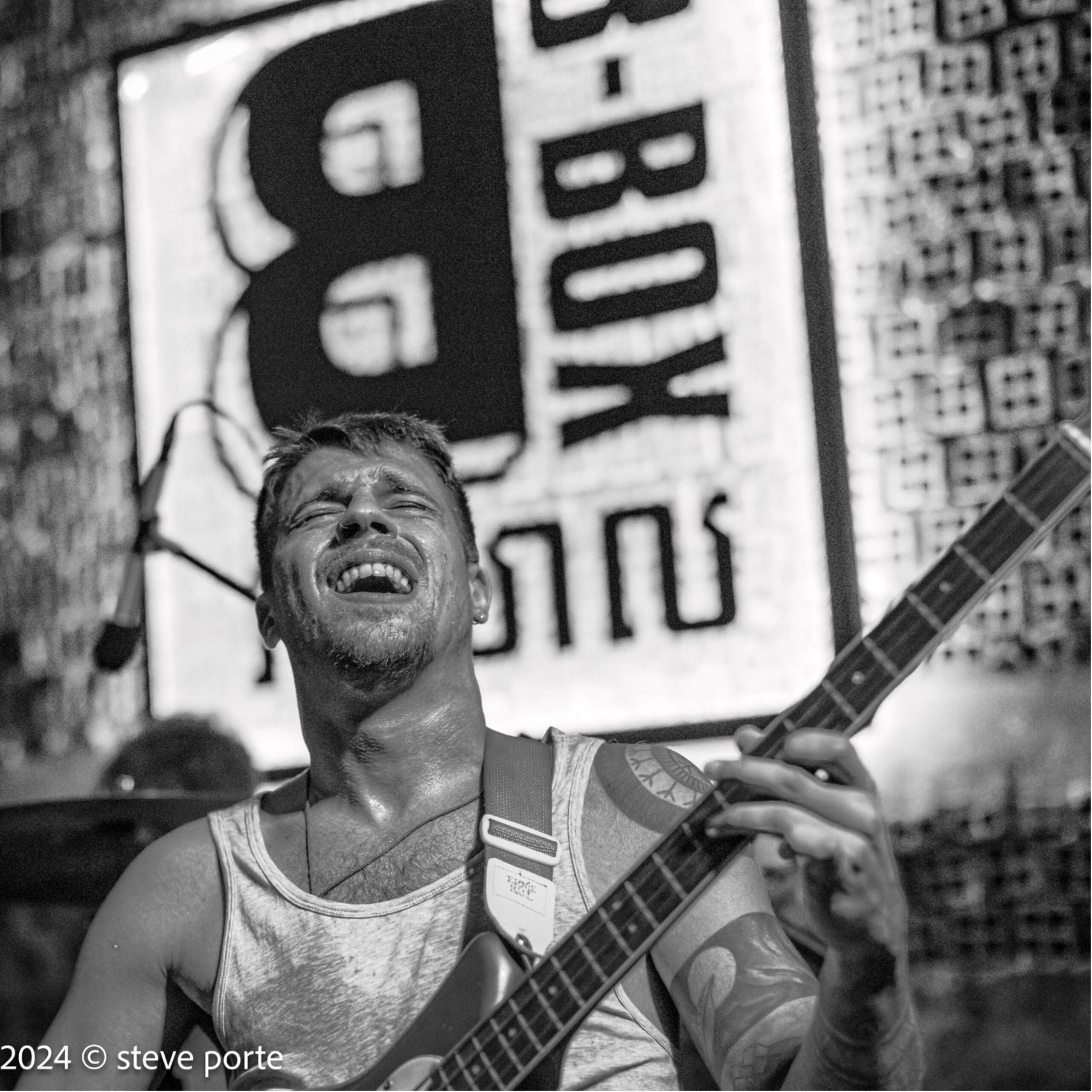 Theo Mahmuti, Skeleton Goode bassist, performing in Phnom Penh in 2024. Steve Porte