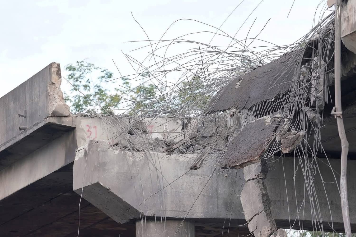 Smoke rises from an explosion near the 180m Victory bridge, in Pursat province’s Veal Veng district. Transport ministry