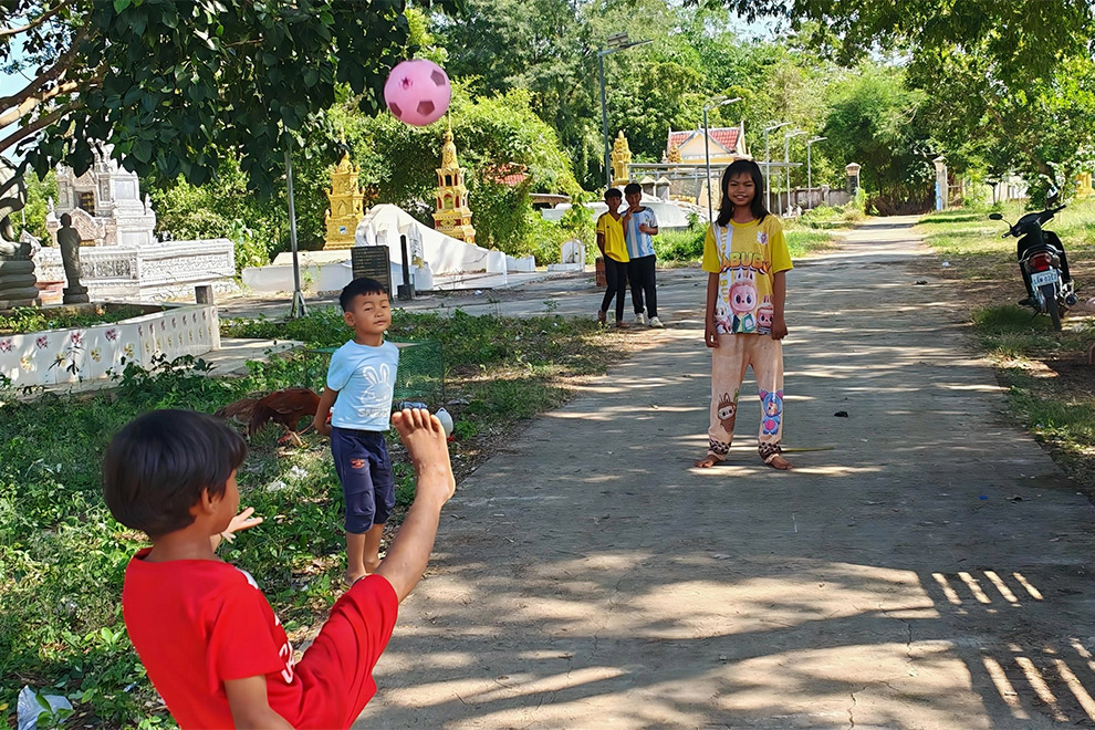 Children play with a football at an evacuation centre in Bavel district, Battambang province. Hong Raksmey