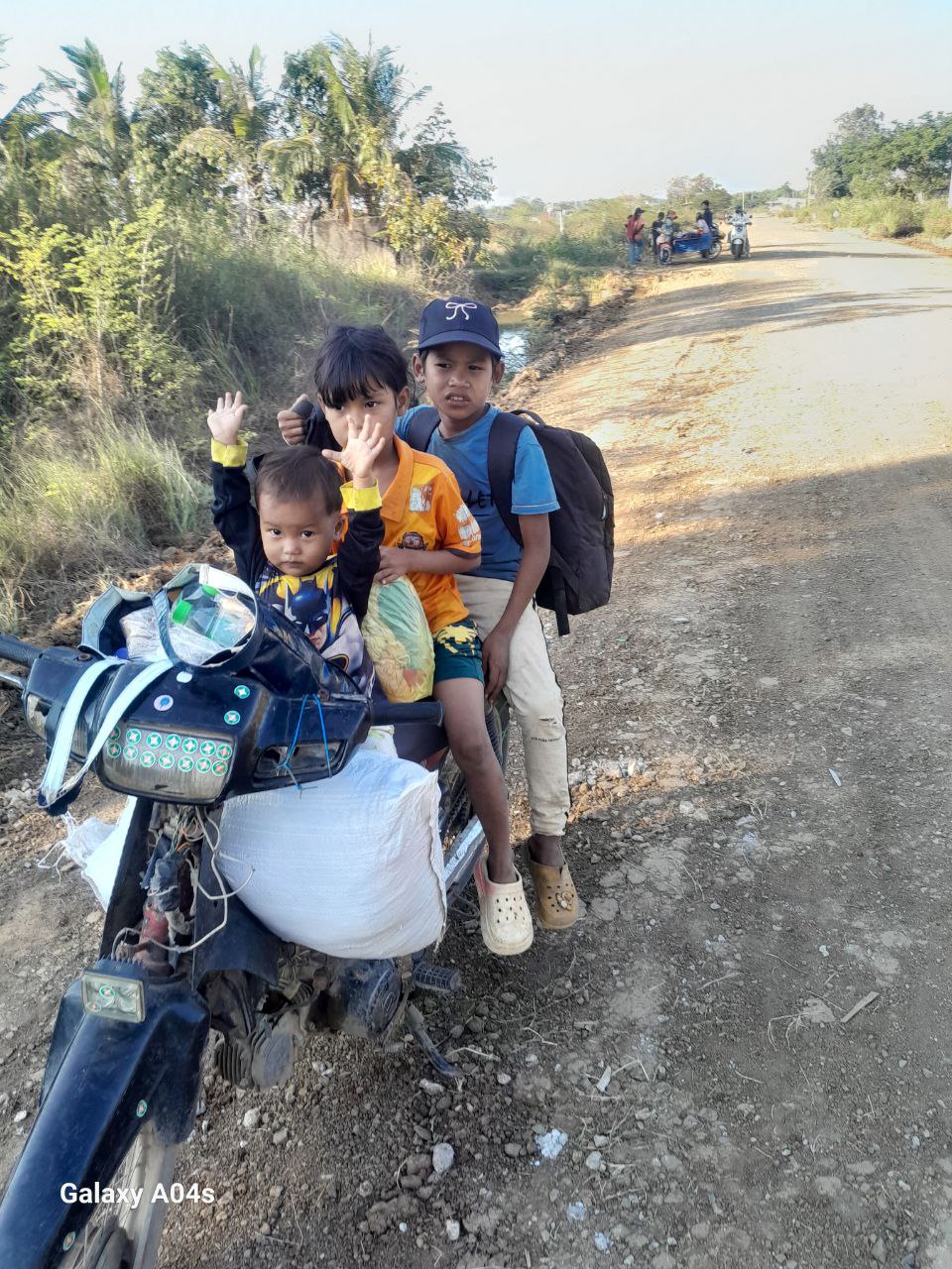 The single father fled Thai shelling with his three young children carrying nothing but a very old motorbike and about $2.50 in cash. Supplied