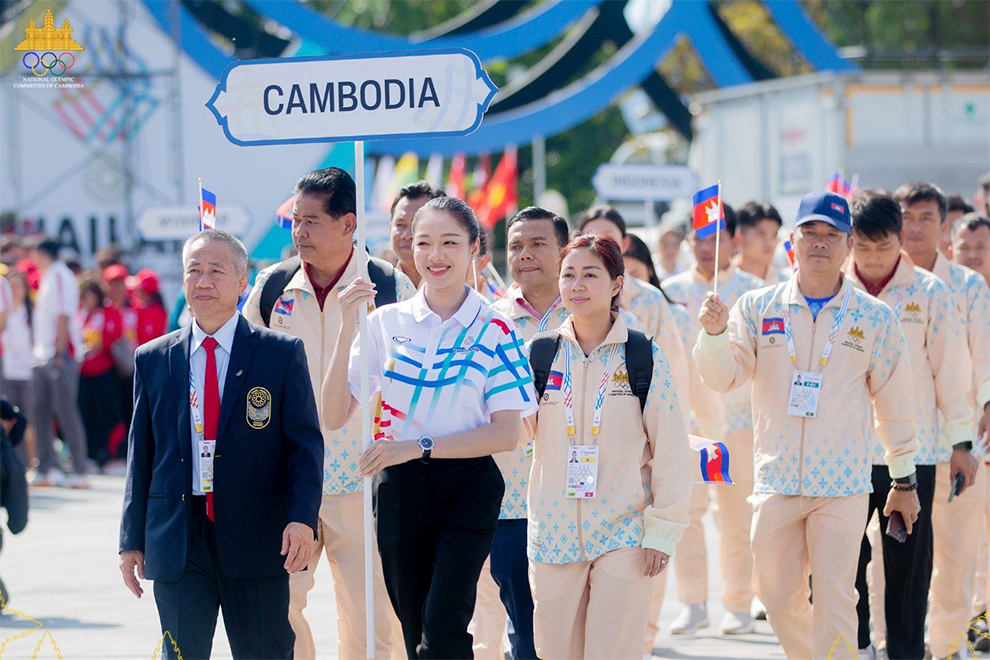 NOCC secretary-general Vath Chamroeun (left) led the Cambodian delegation at the 33rd SEA Games in Thailand, before Cambodia decided to withdraw due to pressure from some Thai leaders and citizens who politicised the event during a period of conflict involving Thailand and Cambodia. Suppplied
