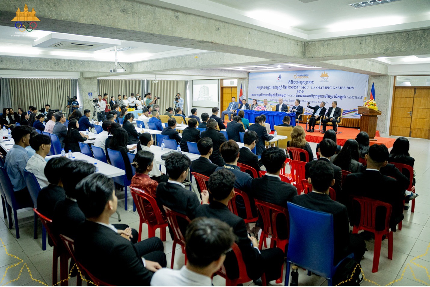 Representatives of national sports federations and relevant stakeholders attended the MoU signing ceremony between AmCham and NOCC. NOCC