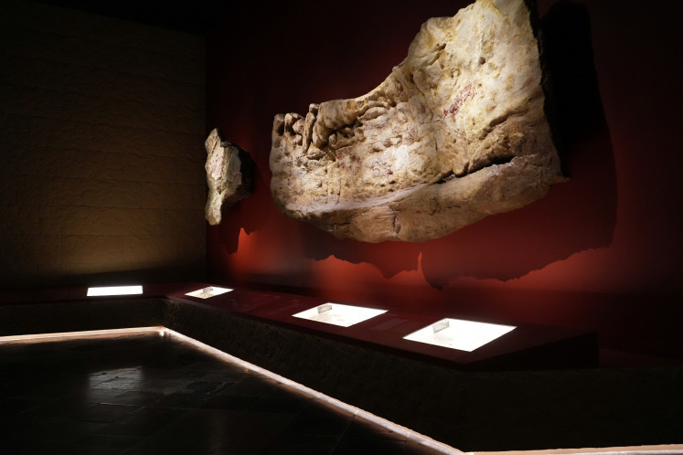 Marks of early life: Replicas of prehistoric rock wall art are shown as part of the Early History exhibition on Dec. 17, 2025, at the National Museum of Indonesia in Jakarta, providing context for the development of early human life. PHOTO: INDONESIAN HERITAGE AGENCY/THE JAKARTA POST