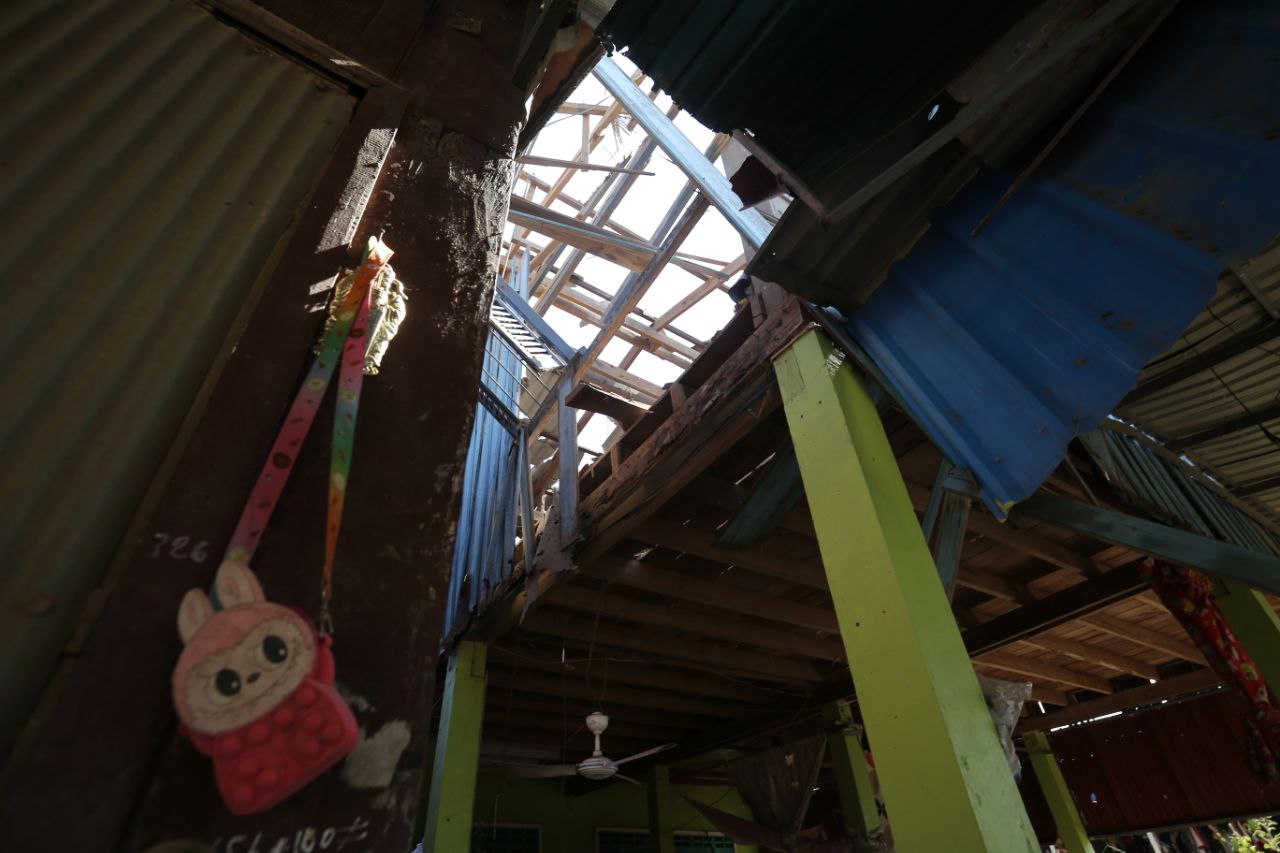 An elderly woman takes her disabled niece to a safety centre in Banteay Meanchey province's Samroang city. Hong Raksmey
