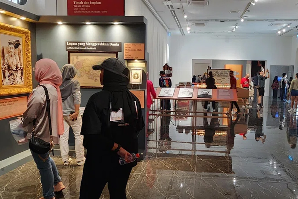 Visitors exploring exhibition galleries within the Sultan Abdul Samad building. PHOTO: THE STRAITS TIMES