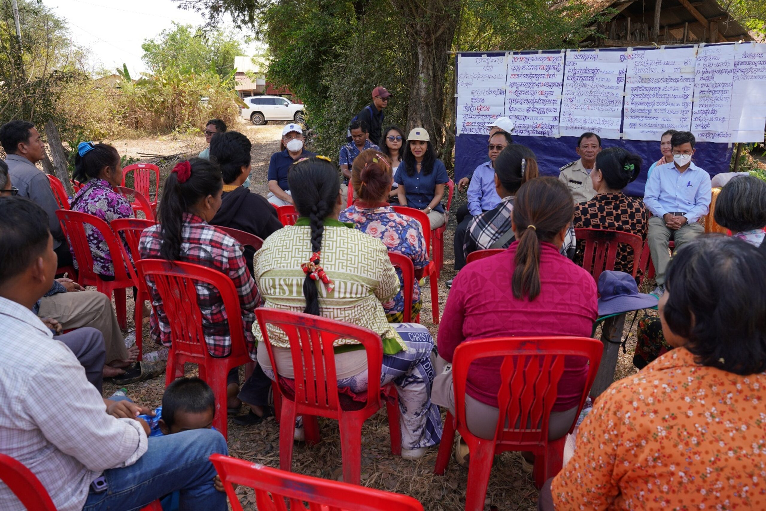 A small-scale vegetable farmer harvests herbs in Samrong village. Hong Raksmey 