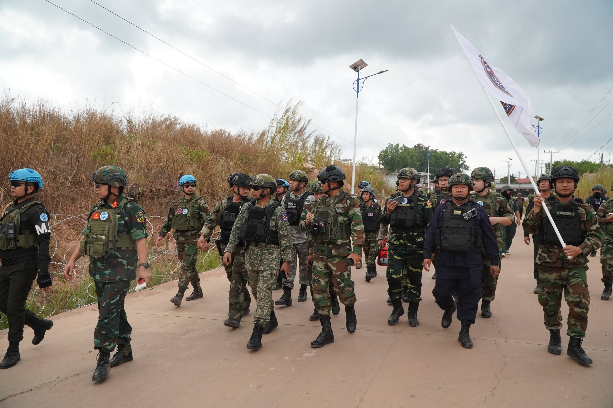 The ASEAN Observer Team (AOT) inspect Thma Da area on February 6. Supplied