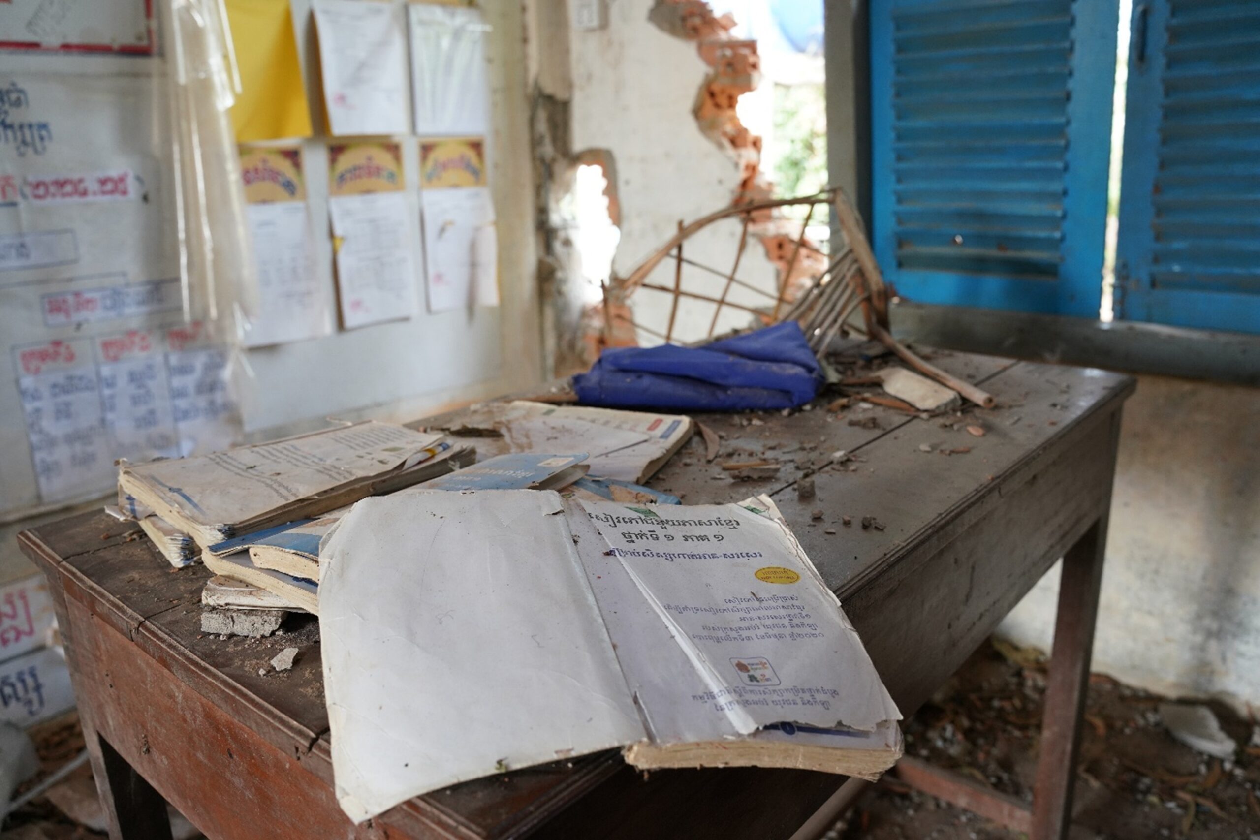 Lay Phalla, principal of Tamone Senchey Primary School, examines the temporary classrooms. Hong Raksmey 