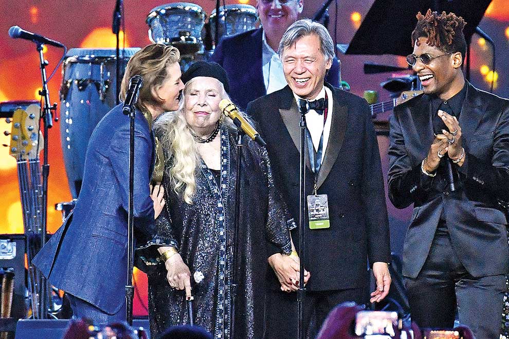 Artists hail revolutionary Mitchell at pre-Grammy