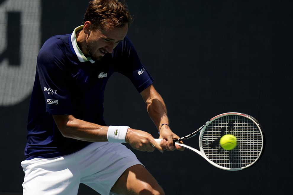 Medvedev through as Murray downed