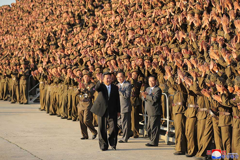 North Korea marks founder's birth with public procession but no military parade