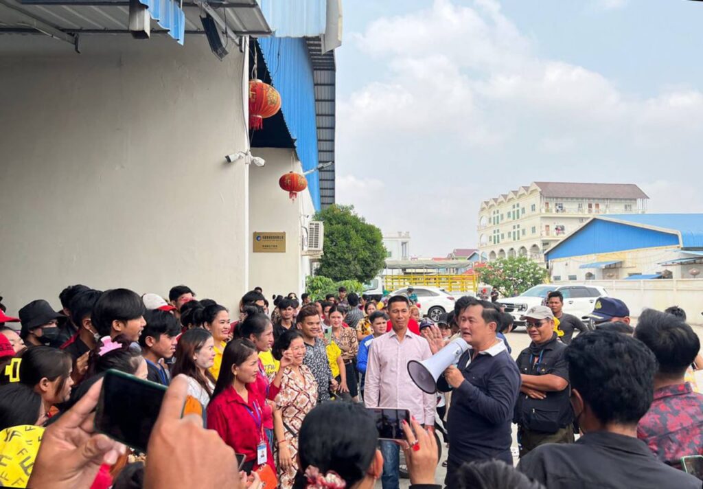 Factory workers end protest after owner agrees to pay wages