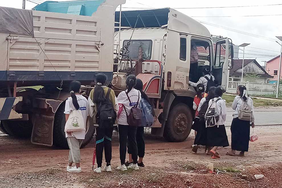 Kampong Seila students thumb rides to school
