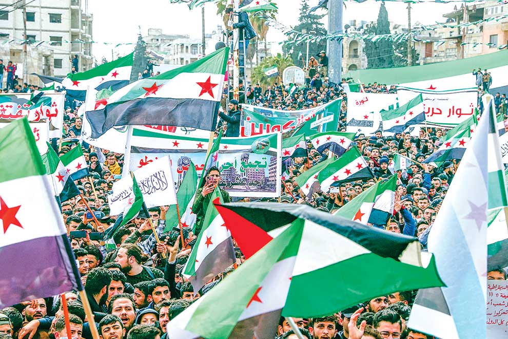 Syria enclave marks 11 years since beginning of uprising