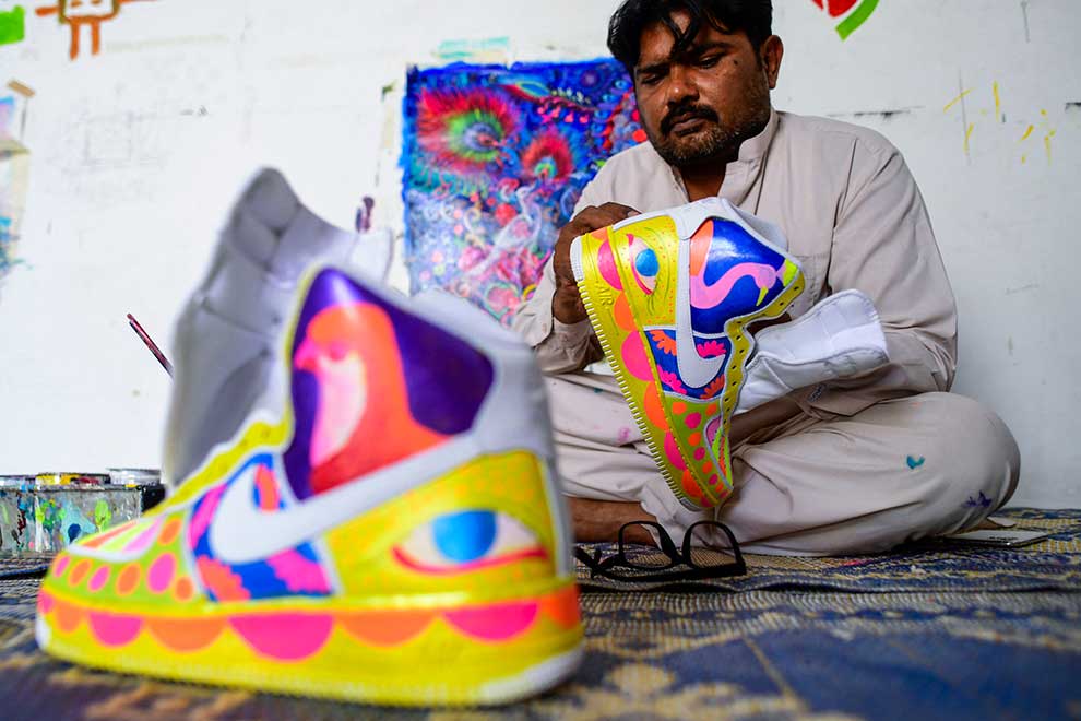 Pakistani truck artist gives sneakers colourful image